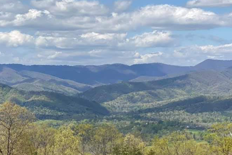 mountains surrounding golf course